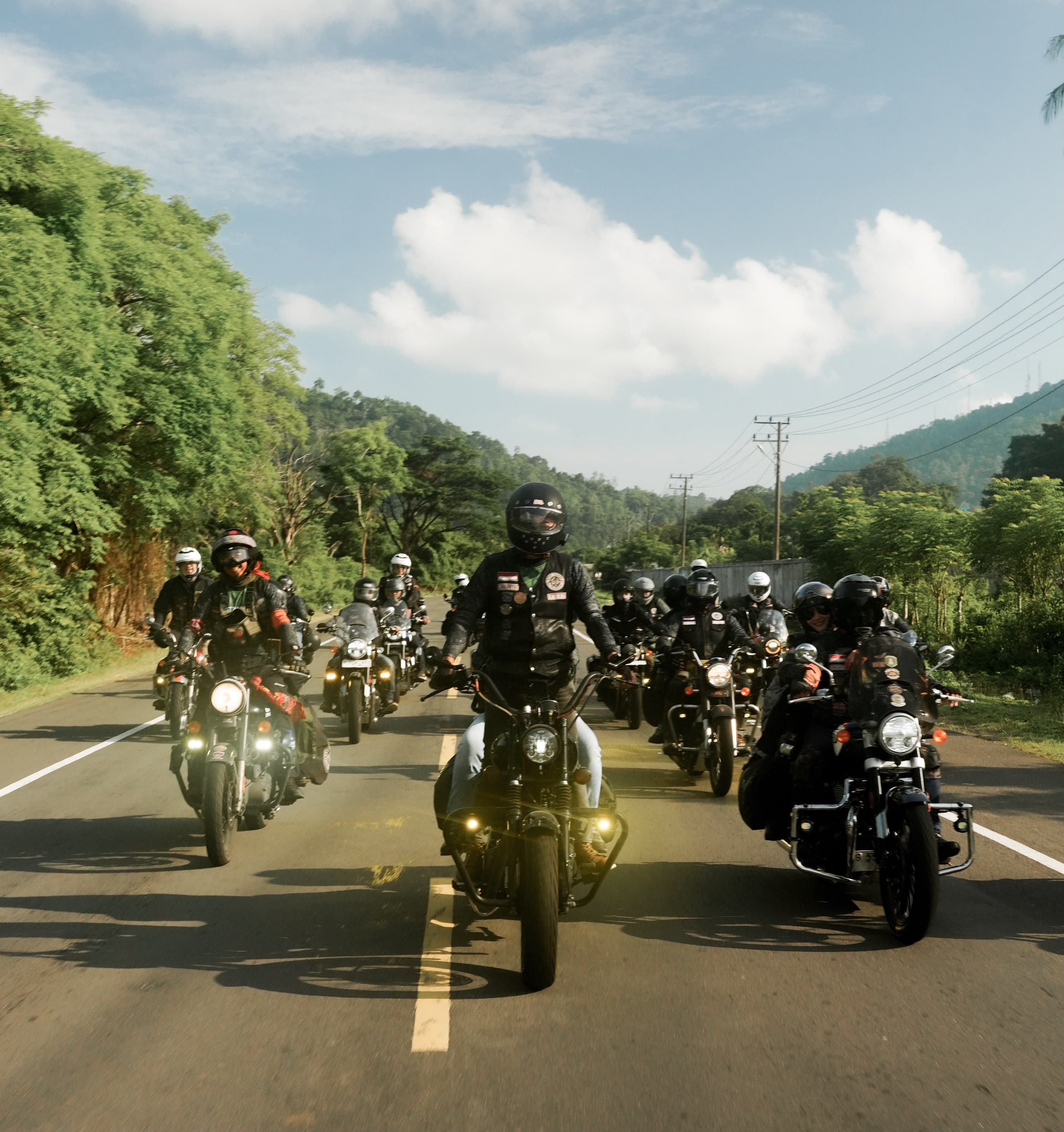 Riders touring on an open road